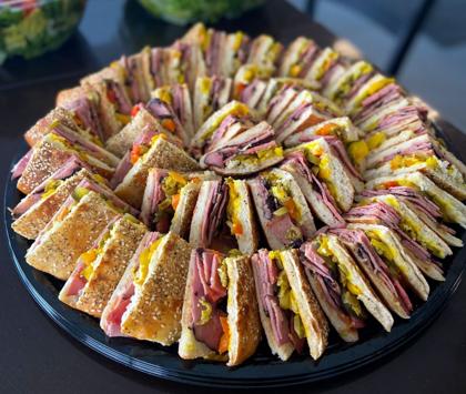 A large Eisenberg's catering platter of assorted sandwiches and wraps
